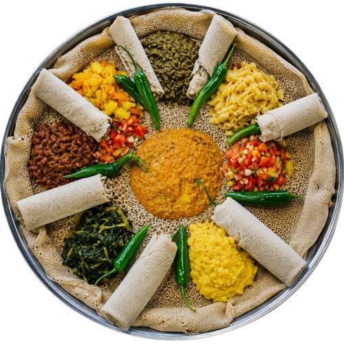 Colorful Ethiopian beyaynetu platter on injera